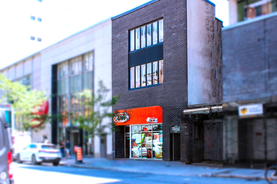 328-330 Rue Sainte-Catherine E, Montréal, QC à vendre - Photo de l’immeuble – Image 2 sur 6