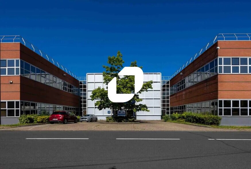 Local d’activités dans Saint-Thibault-des-Vignes à louer - Photo de l’immeuble – Image 1 sur 11