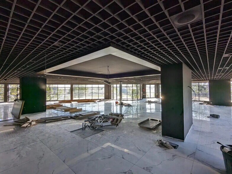 Local commercial dans Bron à louer - Photo de l’immeuble – Image 3 sur 10