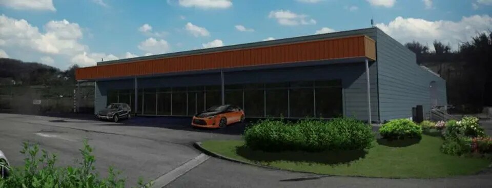 Local commercial dans Ruy-Montceau à louer - Photo de l’immeuble – Image 1 sur 7