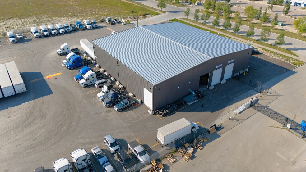 261188 Wagon Wheel Way, Rocky View No 44, AB à vendre - Photo de l’immeuble – Image 3 sur 4