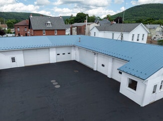 Plus de détails pour 25 E Pulteney St, Corning, NY - Bureau à vendre