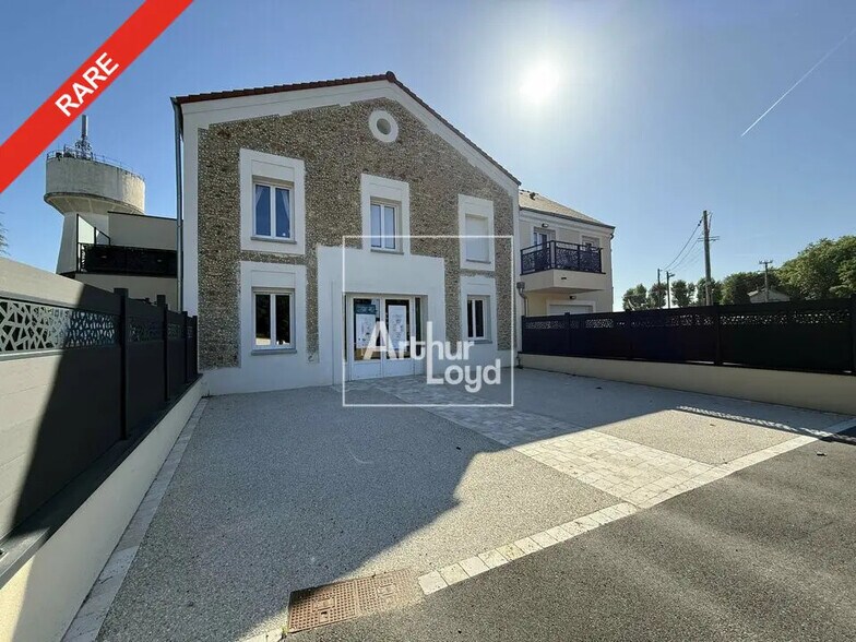 Local commercial dans Grisy-Suisnes à louer - Photo de l’immeuble – Image 1 sur 7