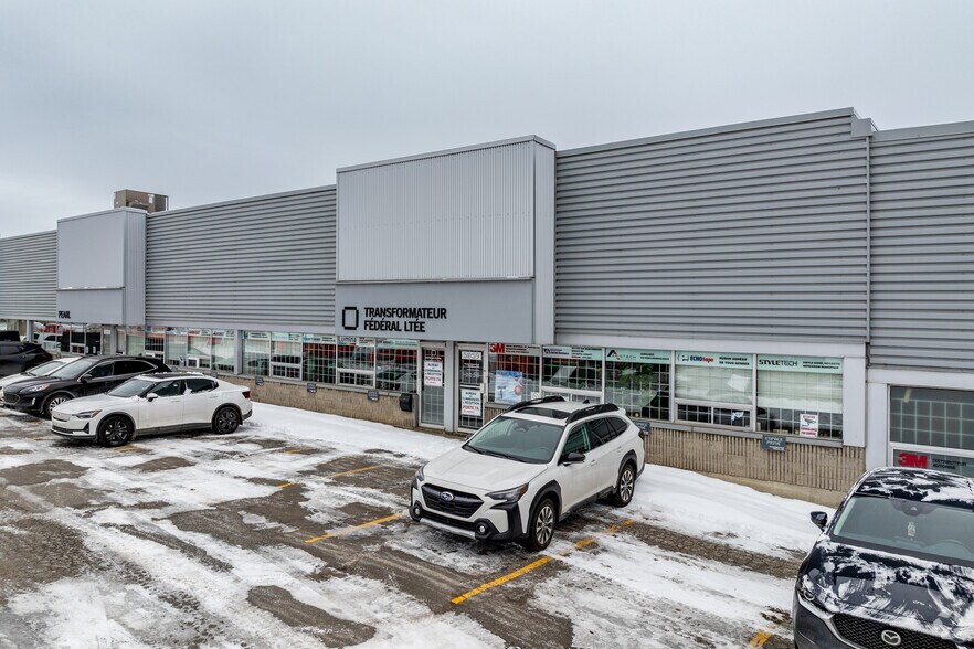 5001-5099 Boul Saint-Jean-Baptiste, Montréal, QC à vendre - Photo de l’immeuble – Image 2 sur 4