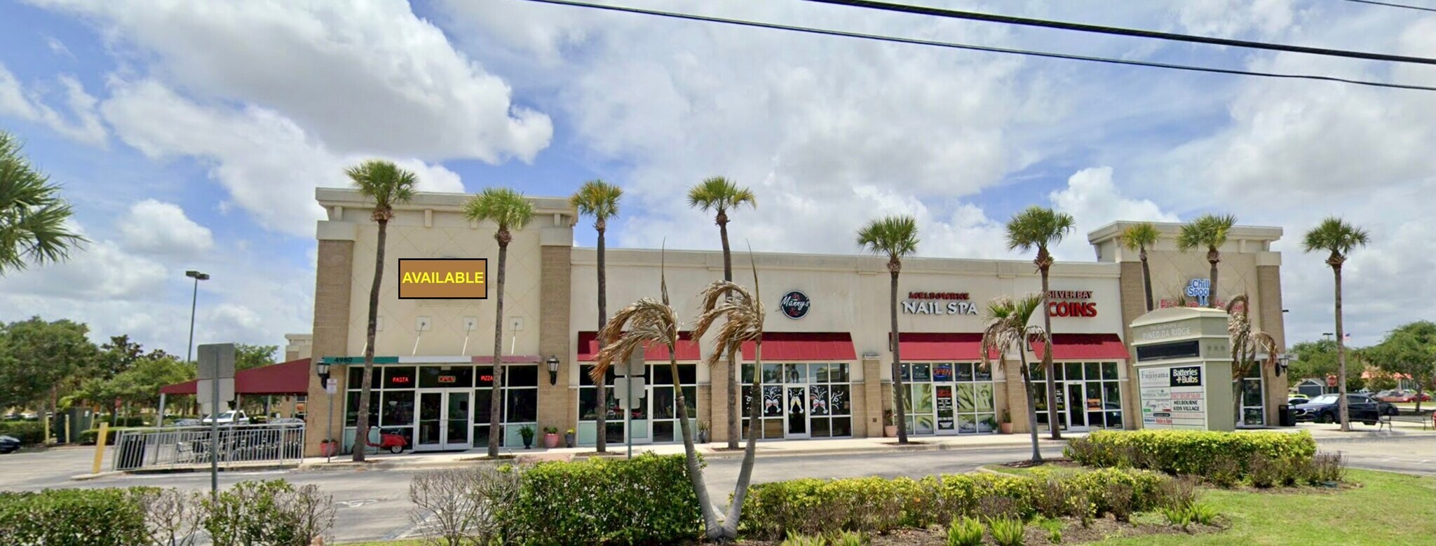 5100 N Wickham Rd, Melbourne, FL à louer Photo de l’immeuble– Image 1 sur 9
