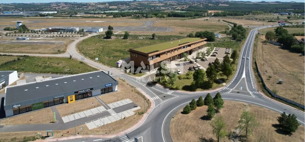 Local commercial dans Andrézieux-Bouthéon à louer - Photo de l’immeuble – Image 2 sur 2