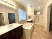 Primary Bathroom with Separate Soaking Tub, Walk-In Shower, 2 Vanities