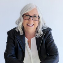 Leslie Dougherty, Broker/Owner