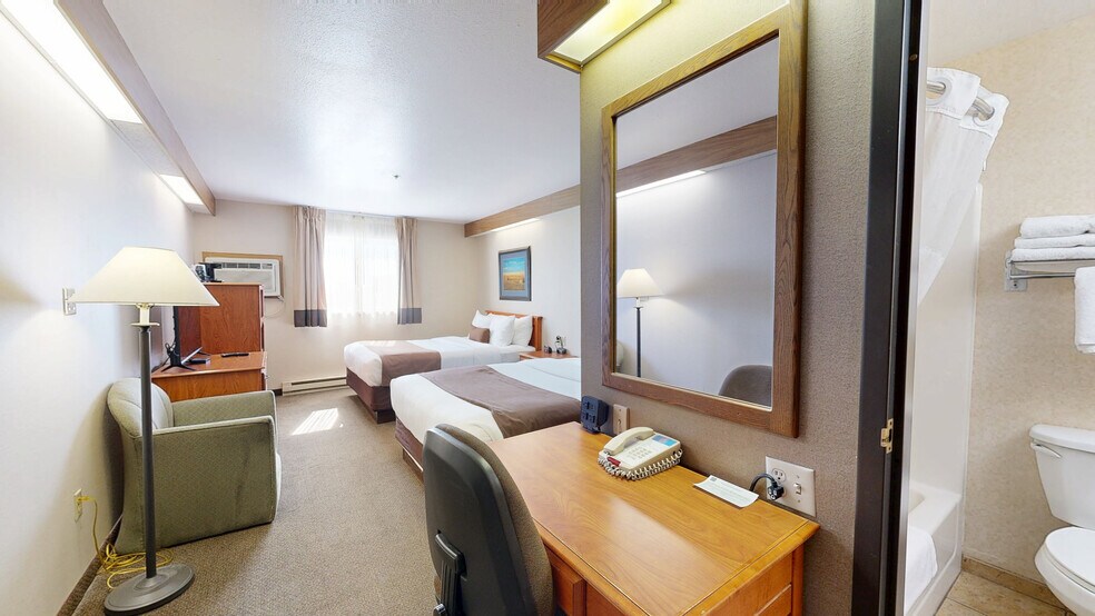 Dual-Branded Studio 6 / Motel 6 Minot portefeuille de 2 biens à vendre sur LoopNet.fr - Numérisation 3D Matterport – Image 2 sur 22