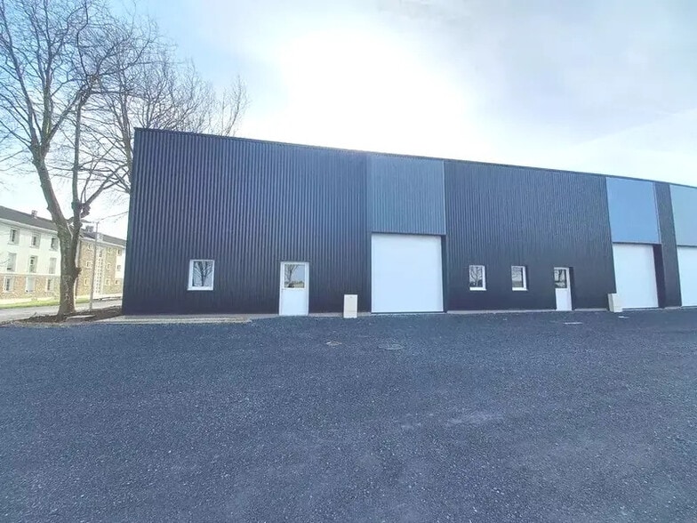 Local d'activités dans Bretteville-sur-Odon à vendre - Photo de l’immeuble – Image 1 sur 4