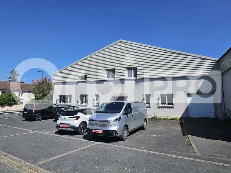 Local d’activités dans Tinqueux à louer - Photo de l’immeuble – Image 1 sur 7