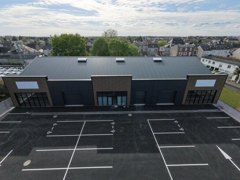 Local commercial dans Fleury-les-Aubrais à louer - Photo de l’immeuble – Image 1 sur 3