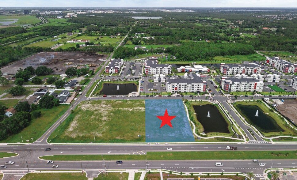 14221 Boggy Creek Road, Orlando, FL à vendre - Photo de l’immeuble – Image 2 sur 3