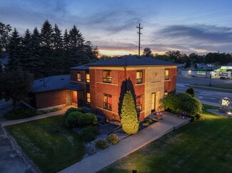 Plus de détails pour 1104 S Mitchell St, Cadillac, MI - Bureau à vendre