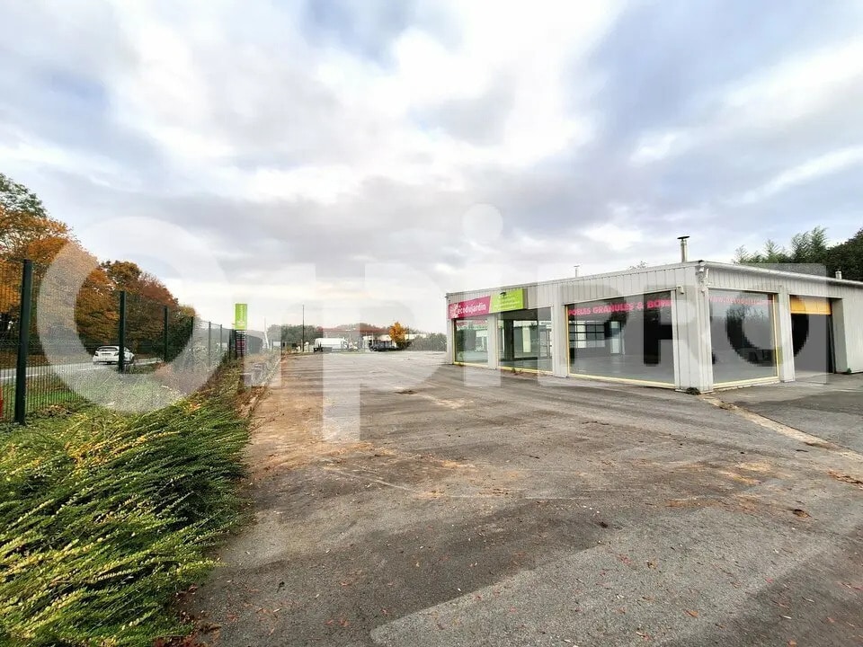 Local commercial dans Muizon à louer Photo de l’immeuble– Image 1 sur 13