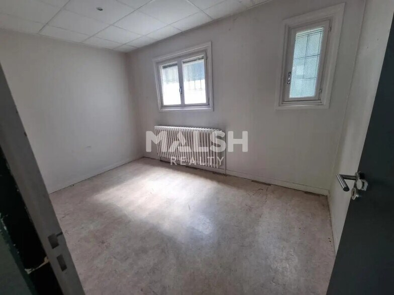 Local commercial dans OULLINS-PIERRE-BÉNITE à louer - Photo intérieure – Image 2 sur 3