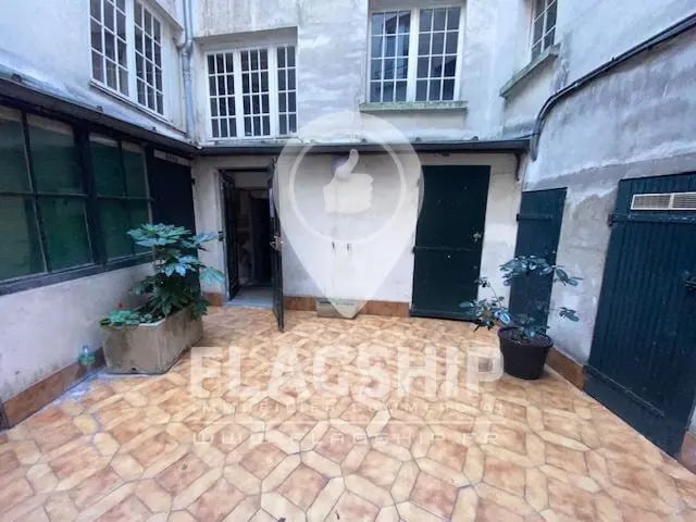 Local commercial dans Paris à louer - Photo de l’immeuble – Image 1 sur 6