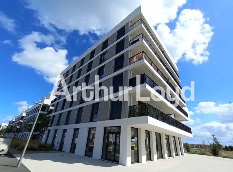 Local commercial dans Fleury-sur-Orne à louer - Photo de l’immeuble – Image 1 sur 2