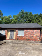 100 E Poplar St, Fayetteville, AR à louer Photo de l’immeuble– Image 1 sur 9