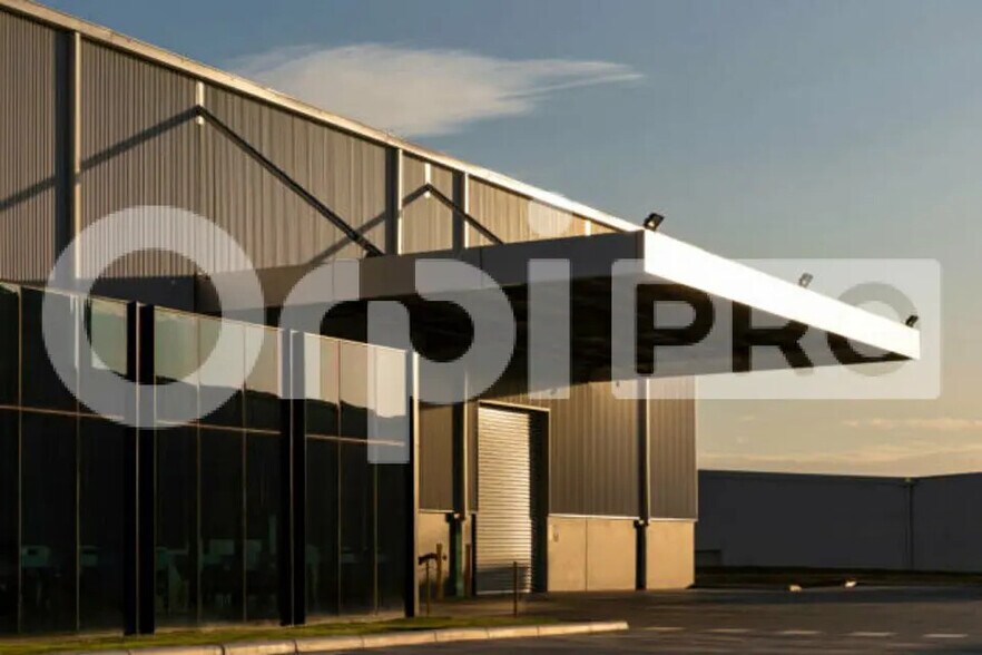 Local d’activités dans Frans à louer - Photo de l’immeuble – Image 1 sur 2