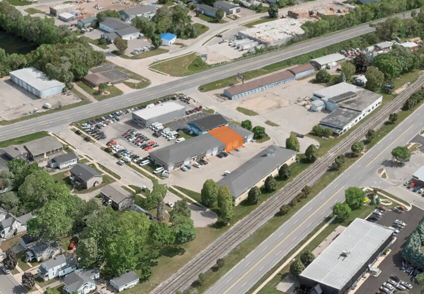 2863-2877 Sanford Ave, Grandville, MI à louer - Photo de l’immeuble – Image 1 sur 2