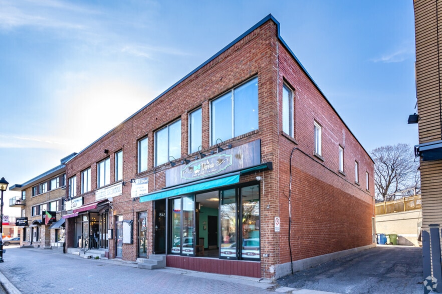 353-345 Rue Saint-Charles O, Longueuil, QC à vendre - Photo de l’immeuble – Image 2 sur 3