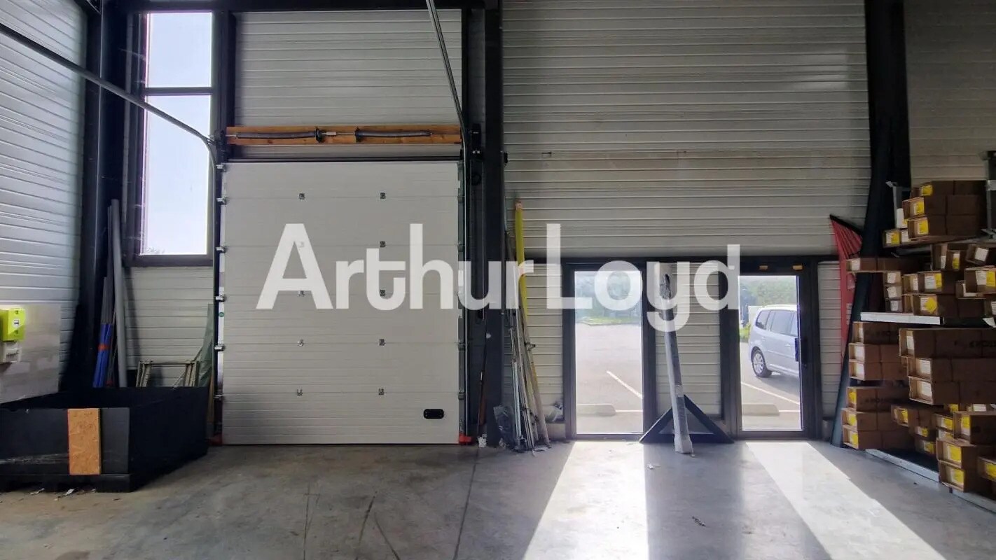 Local d’activités dans Fleury-sur-Orne à louer Photo de l’immeuble– Image 1 sur 3