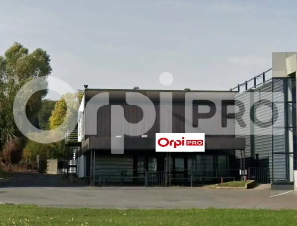 Local commercial dans La Ville-du-Bois à vendre Photo de l’immeuble– Image 1 sur 3