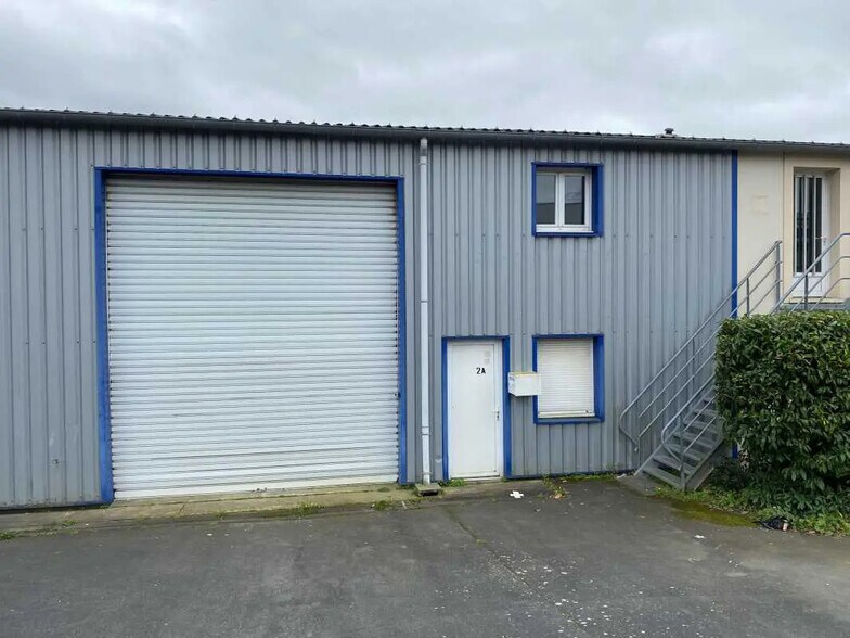 Local d'activités dans BRETTEVILLE-SUR-ODON à vendre - Photo de l’immeuble – Image 2 sur 8