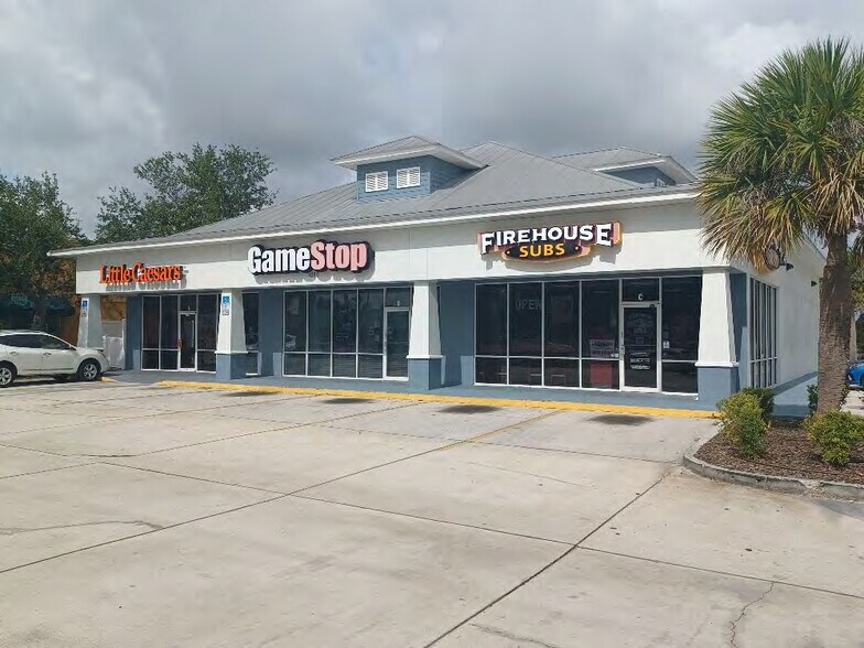 1080 N Wickham Rd, Melbourne, FL à louer - Photo de l’immeuble – Image 1 sur 3