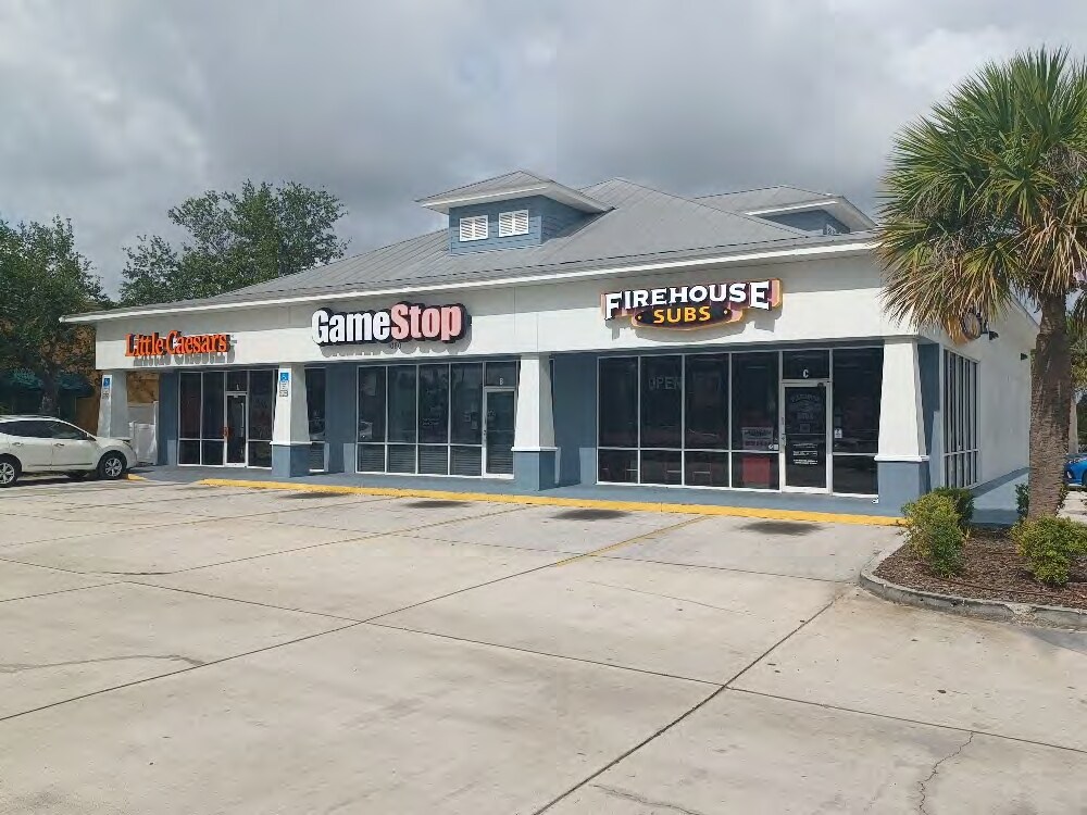 1080 N Wickham Rd, Melbourne, FL à louer Photo de l’immeuble– Image 1 sur 4