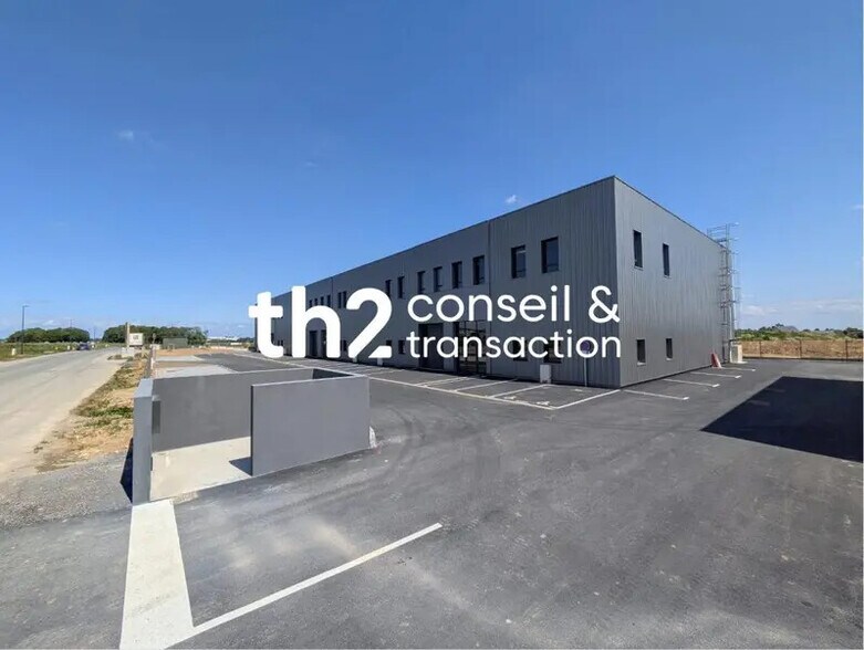 Local commercial dans BRETTEVILLE-SUR-ODON à louer - Photo de l’immeuble – Image 1 sur 5