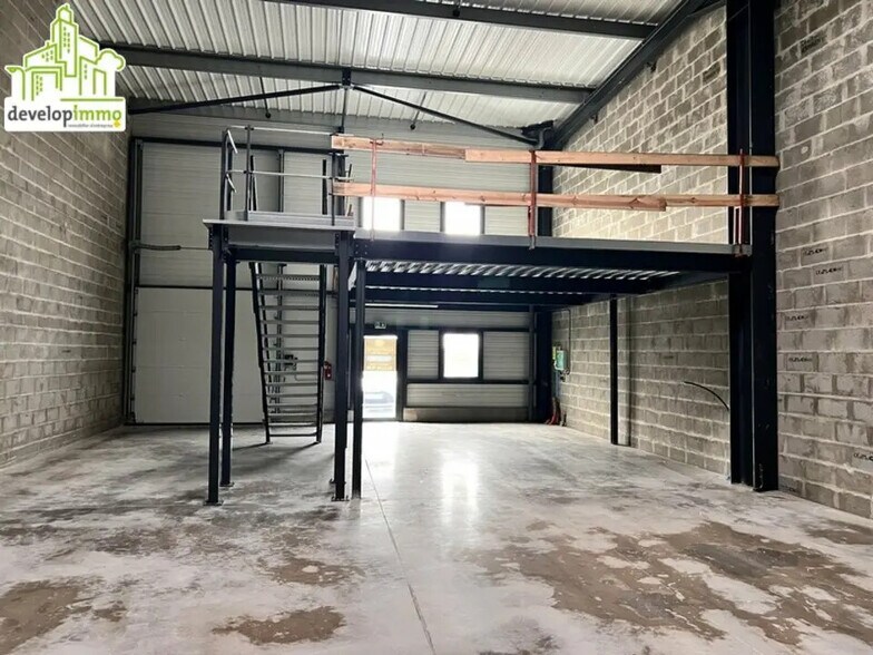 Local d’activités dans BRETTEVILLE-SUR-ODON à louer - Photo de l’immeuble – Image 1 sur 7