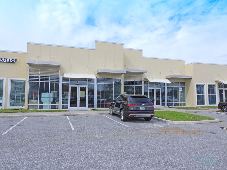 6545 N Wickham Rd, Melbourne, FL à vendre - Photo de l’immeuble – Image 1 sur 9