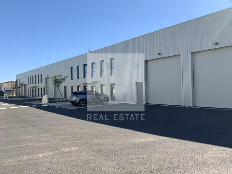 55 Rue Emile Zola, Décines-Charpieu à louer - Photo de l’immeuble – Image 3 sur 11