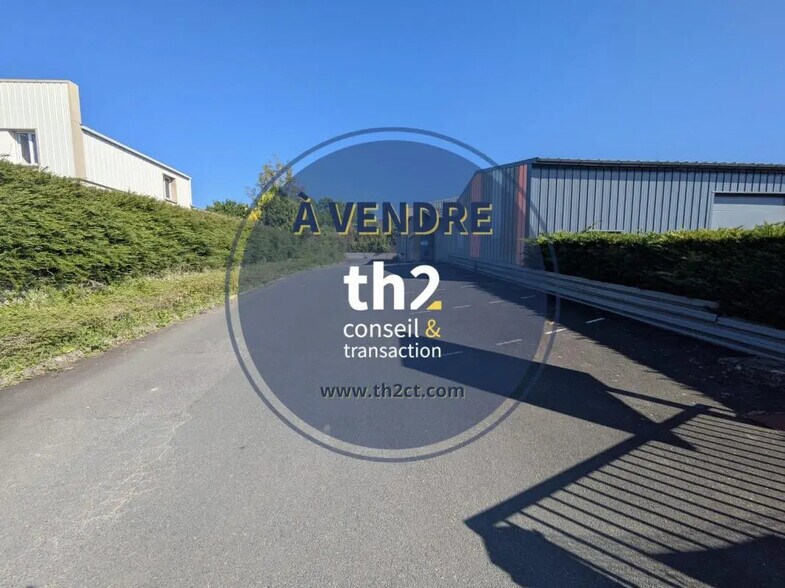 Local d'activités dans BRETTEVILLE-SUR-ODON à vendre - Photo de l’immeuble – Image 2 sur 9