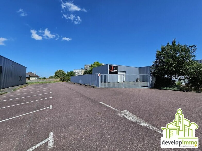 Local d’activités dans Fleury-sur-Orne à louer - Photo de l’immeuble – Image 2 sur 4