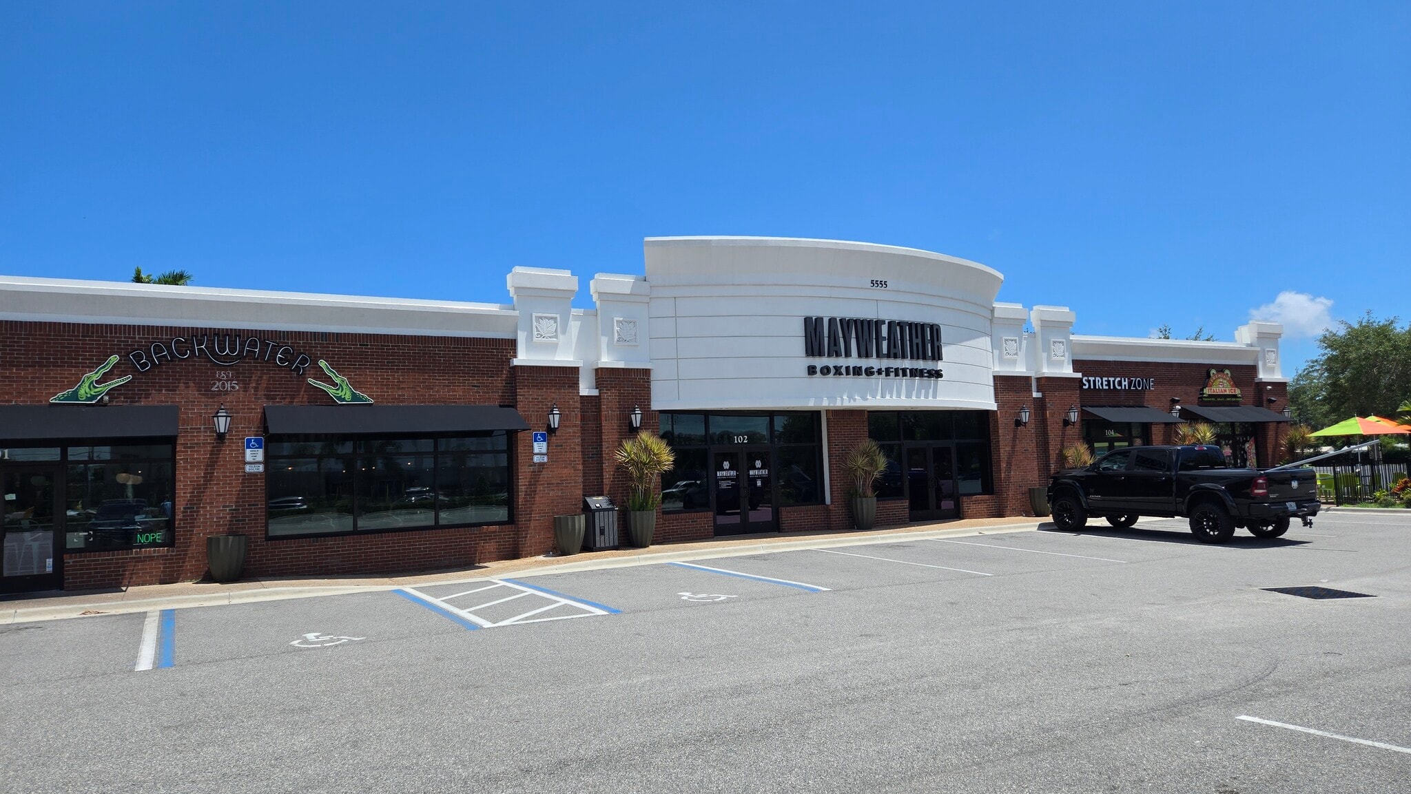 5555 N Wickham Rd, Melbourne, FL à louer Photo de l’immeuble– Image 1 sur 12