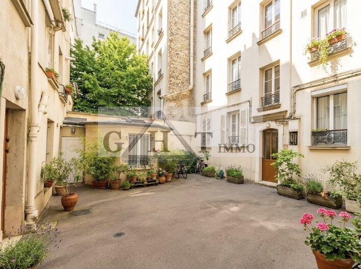 Local commercial dans Paris à vendre - Photo de l’immeuble – Image 1 sur 2