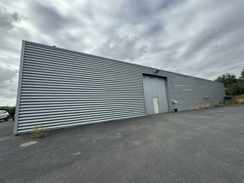 Bureau dans Carpiquet à louer - Photo de l’immeuble – Image 1 sur 7