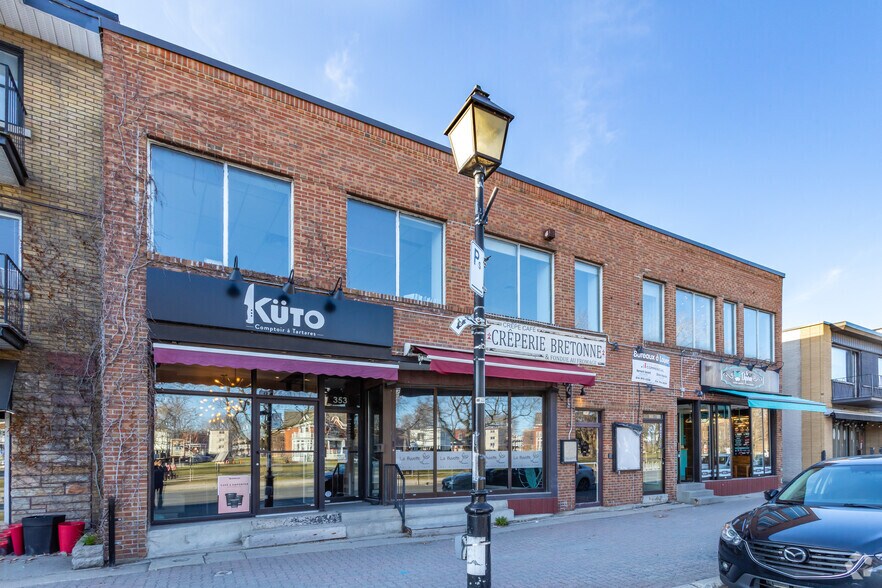 353-345 Rue Saint-Charles O, Longueuil, QC à vendre - Photo principale – Image 1 sur 3