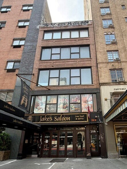 206 W 23rd St, New York, NY à louer - Photo de l’immeuble – Image 1 sur 2