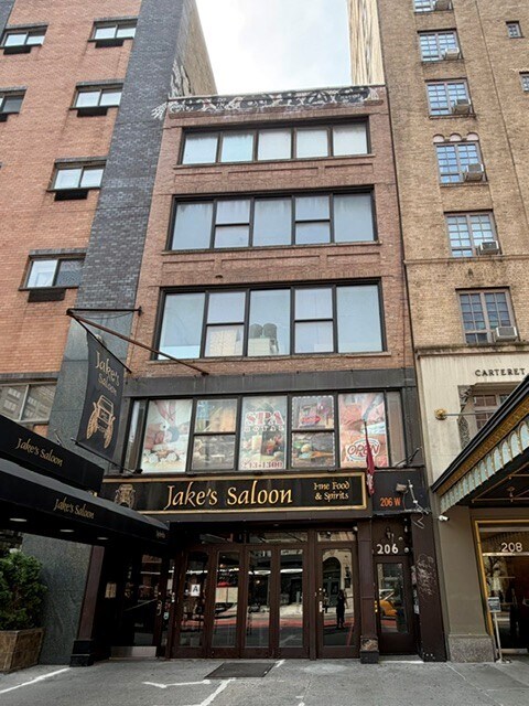 206 W 23rd St, New York, NY à louer Photo de l’immeuble– Image 1 sur 3