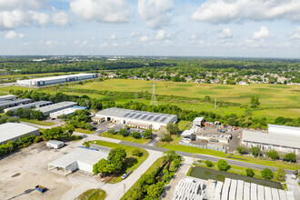 7704 Industrial Ln, Tampa, FL - VUE AÉRIENNE  vue de carte - Image1