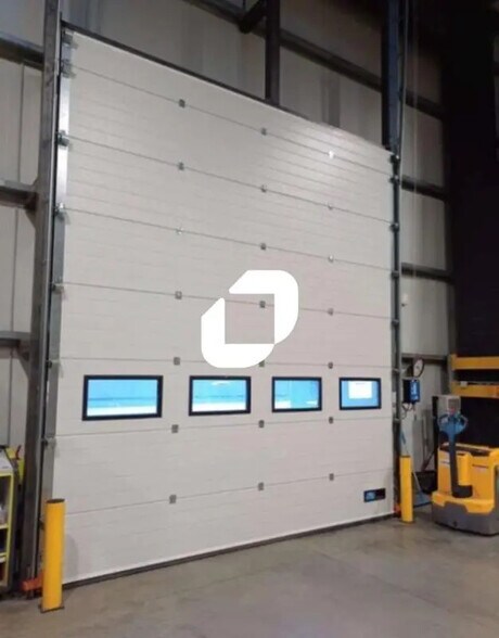 Local d’activités dans Le Cheylas à louer - Photo de l’immeuble – Image 2 sur 4