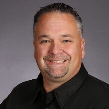 John Tragiai