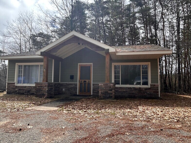 79 Higgins Lake dr, Roscommon, MI à vendre - Photo de l’immeuble – Image 1 sur 20