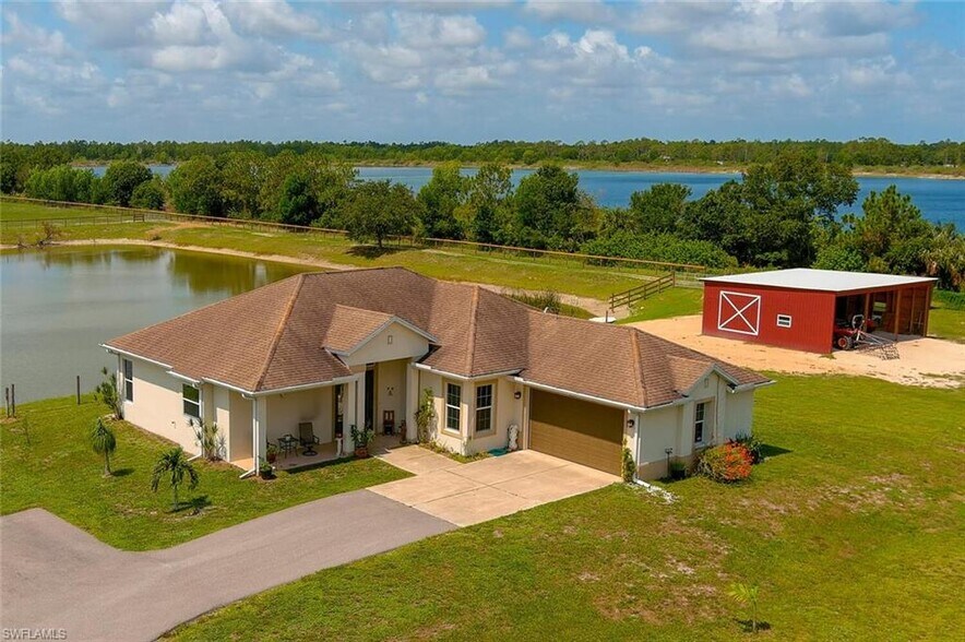 2310 70th Ave NE, Naples, FL à vendre - Photo de l’immeuble – Image 1 sur 8