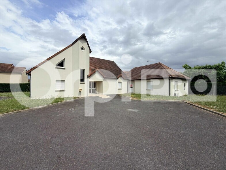 Bureaux/Médical dans Domérat à louer - Photo de l’immeuble – Image 3 sur 12