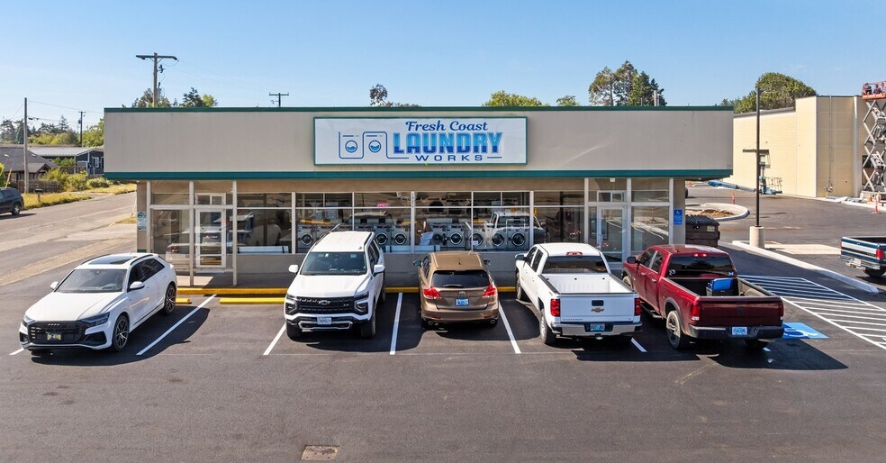 Three state-of-the-art laundromats portefeuille de 3 biens à vendre sur LoopNet.fr - Photo de l’immeuble – Image 1 sur 46